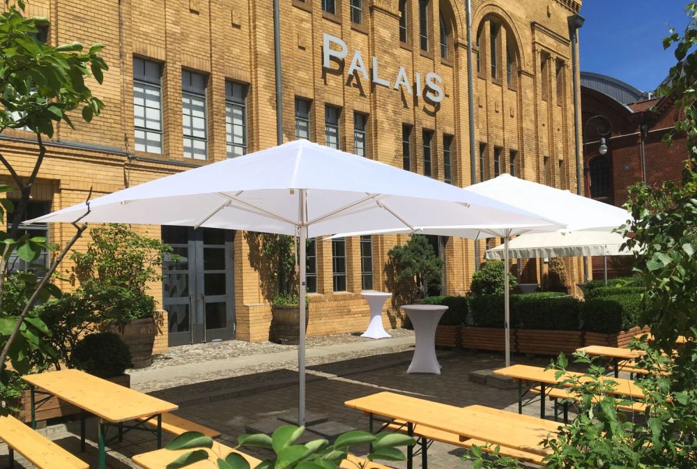 Sunny terrace at the Palais with benches and umbrellas